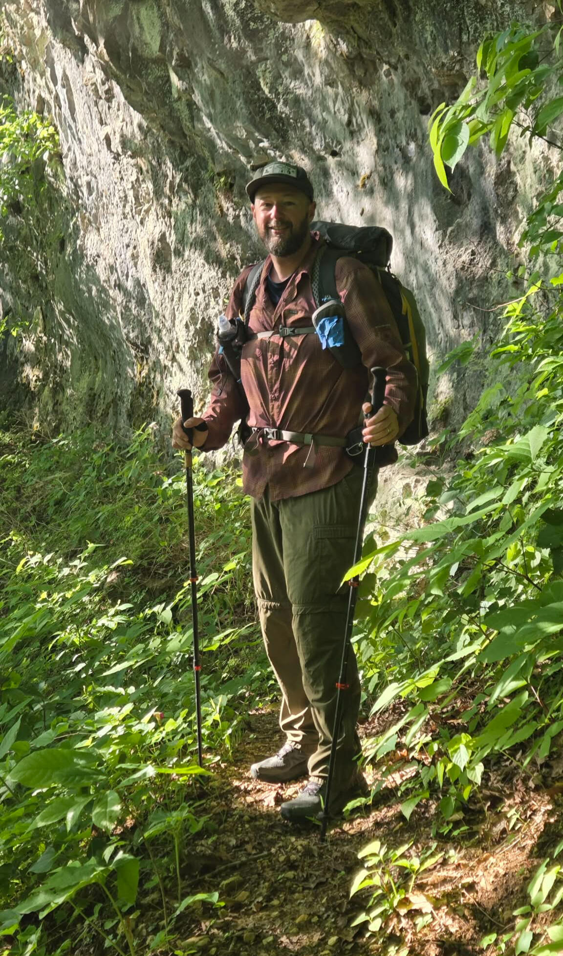 Shayne Martin Shayne Martin with trees in the background, beard and bald, and middle aged with the look of experience.